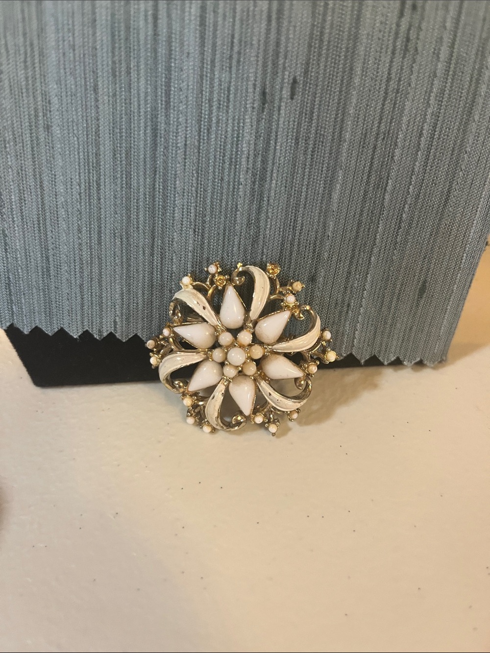 Vintage-Inspired White and Gold Floral Brooch, with milk glass as a flower.